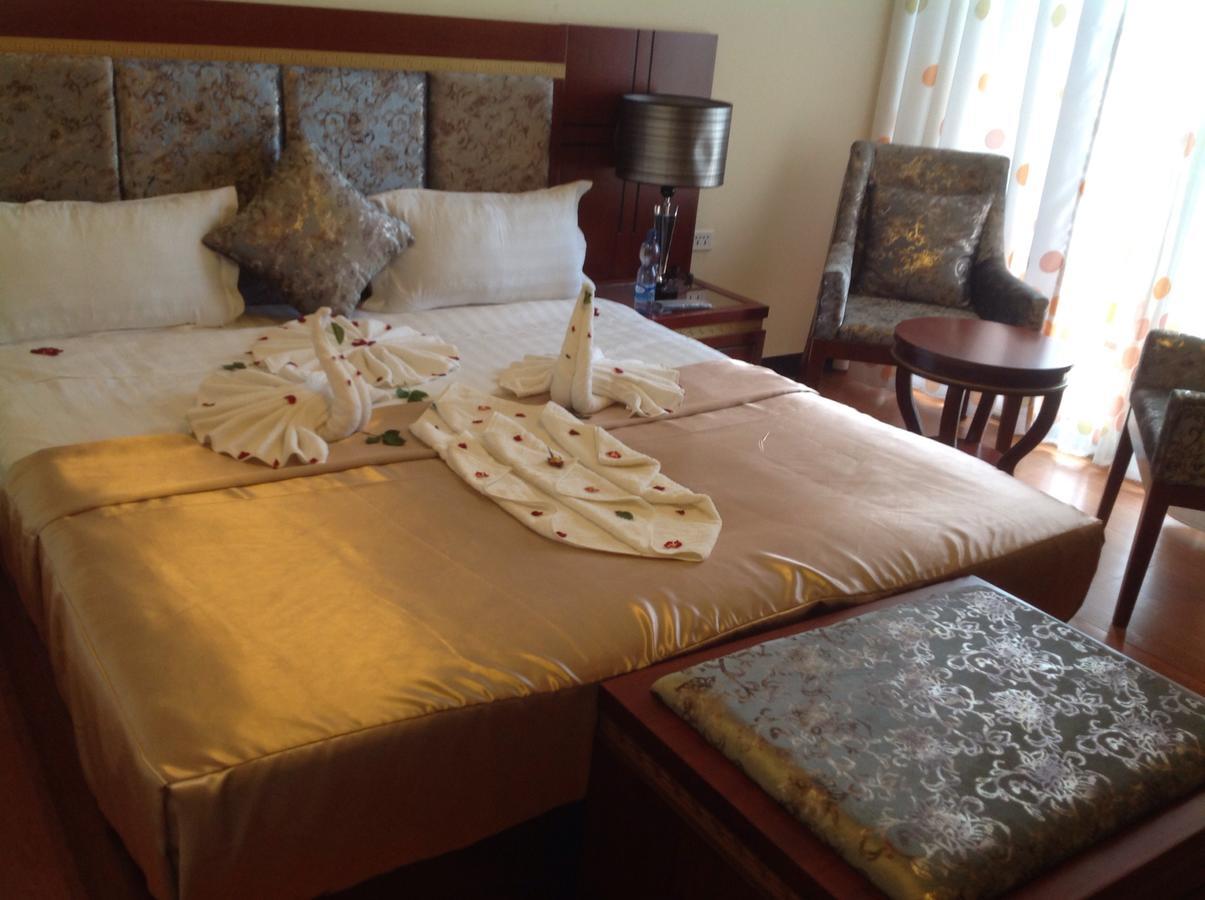 Palm Palace Hotel บาเฮอร์ดาร์ ภายนอก รูปภาพ