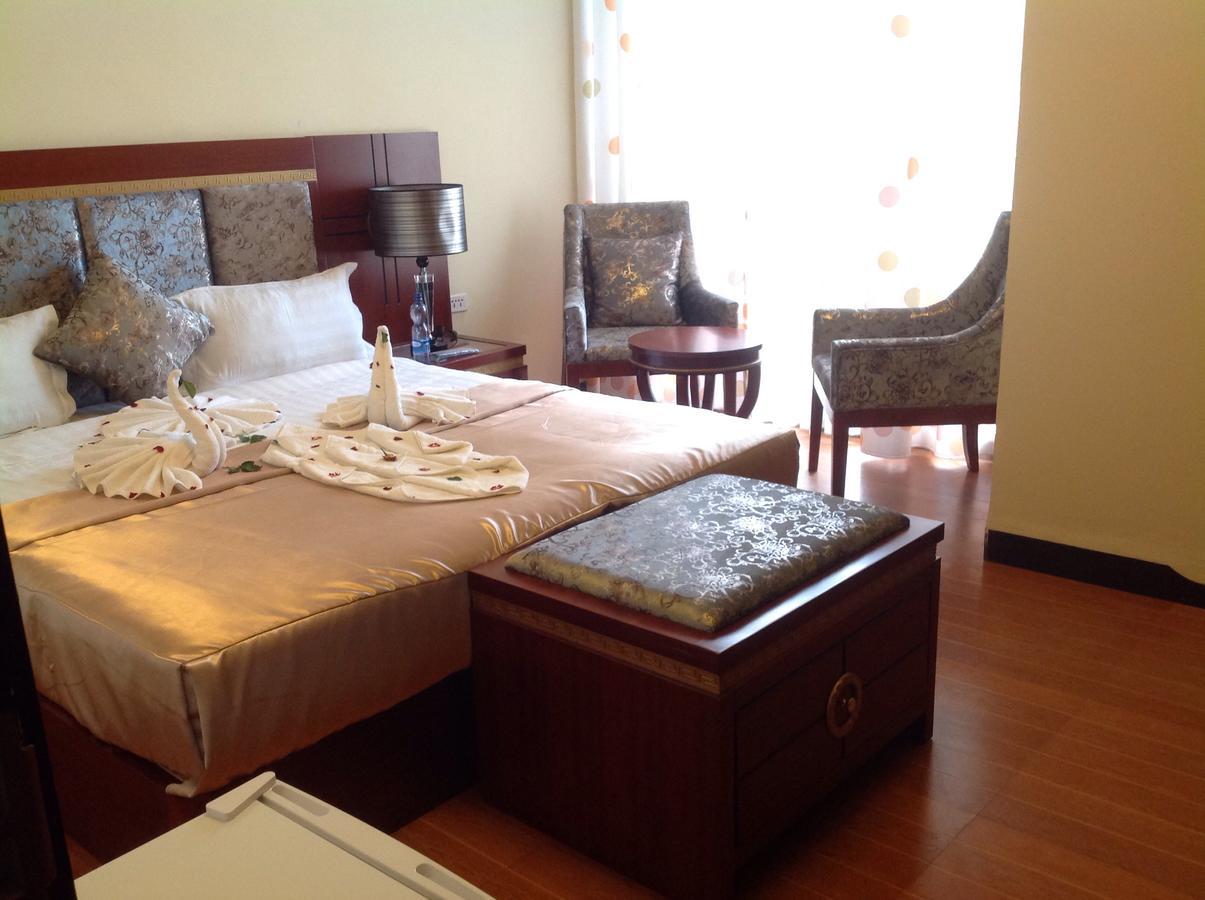 Palm Palace Hotel บาเฮอร์ดาร์ ภายนอก รูปภาพ