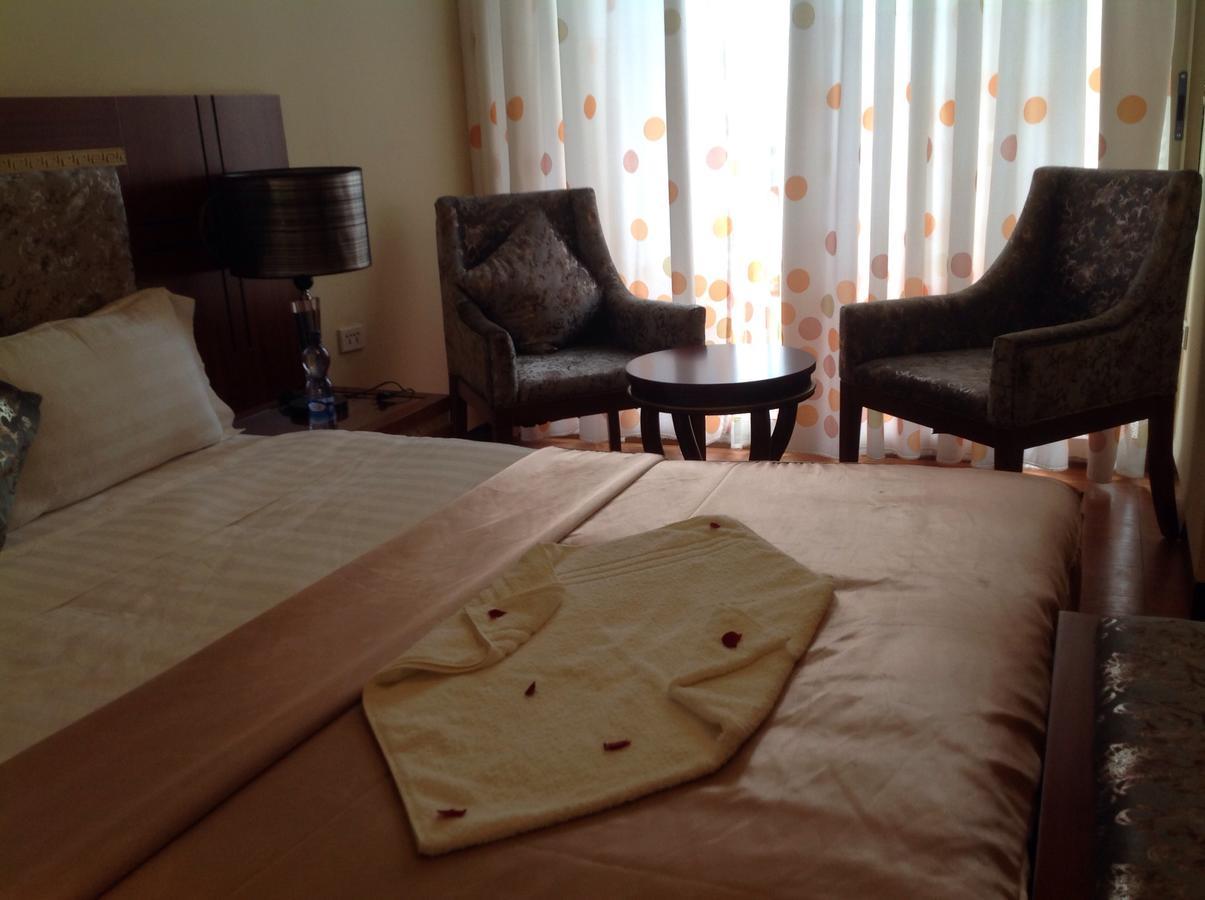 Palm Palace Hotel บาเฮอร์ดาร์ ภายนอก รูปภาพ