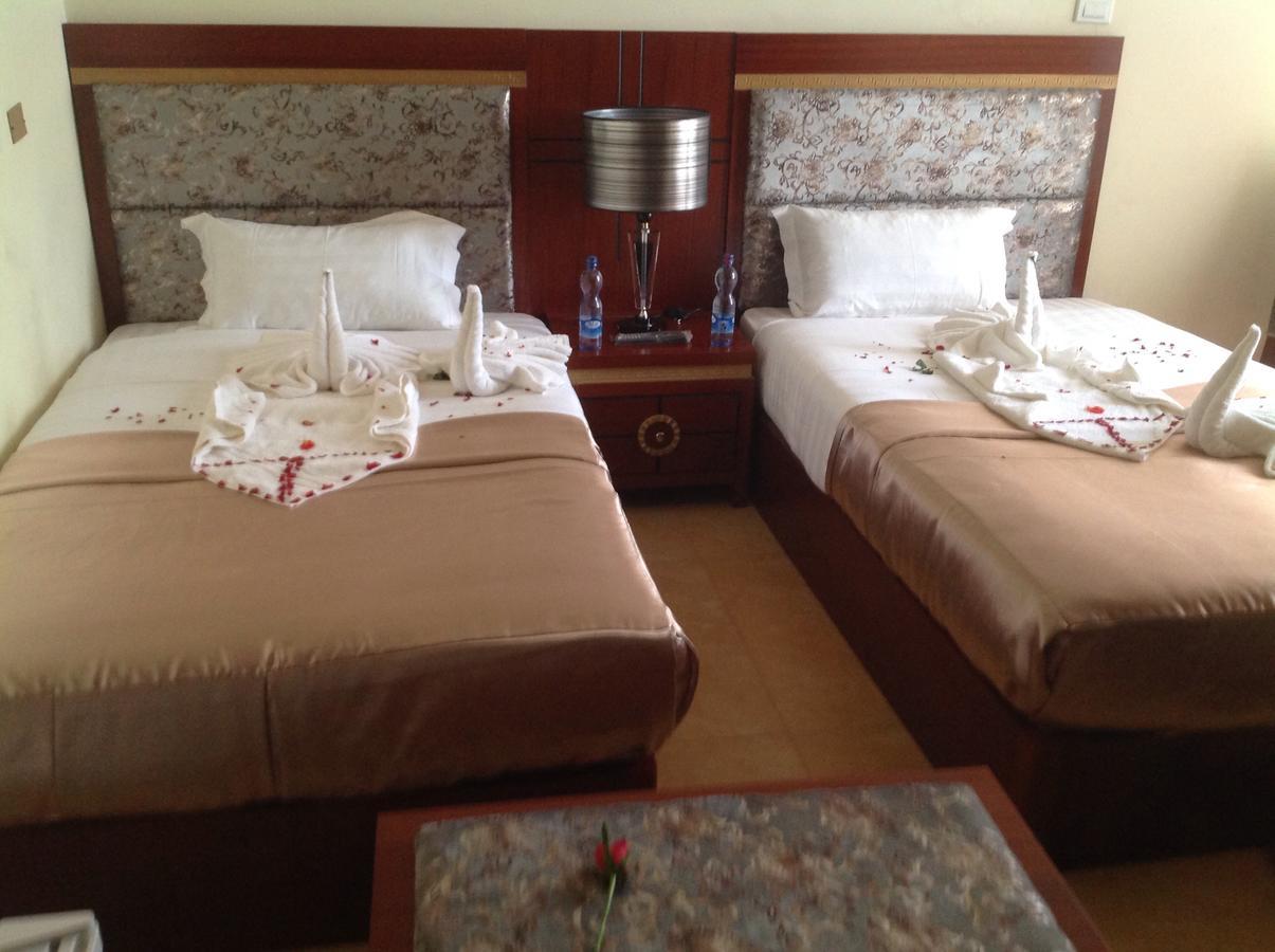 Palm Palace Hotel บาเฮอร์ดาร์ ภายนอก รูปภาพ
