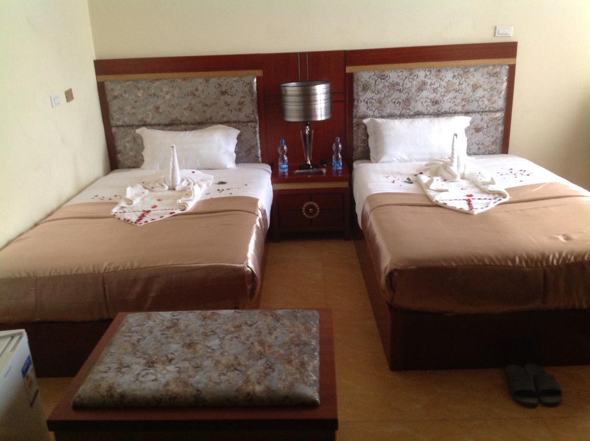 Palm Palace Hotel บาเฮอร์ดาร์ ภายนอก รูปภาพ