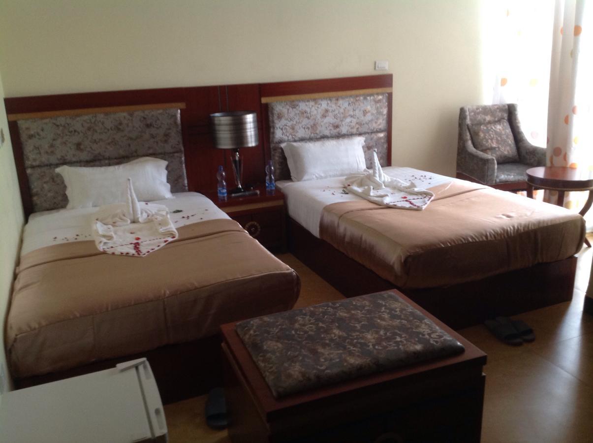 Palm Palace Hotel บาเฮอร์ดาร์ ภายนอก รูปภาพ