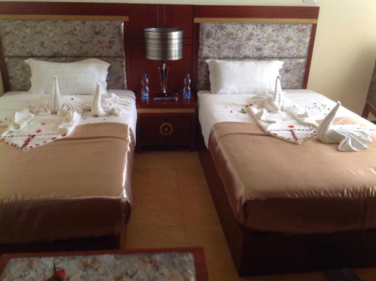 Palm Palace Hotel บาเฮอร์ดาร์ ภายนอก รูปภาพ